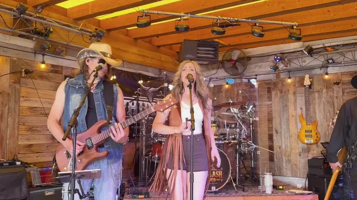 Guitarist and singer out front of the band